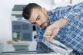 man fixing photocopying machine Royalty Free Stock Photo