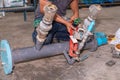 The man fixing water valve faucet using adjustable wrench Royalty Free Stock Photo