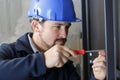 man fixing window Royalty Free Stock Photo