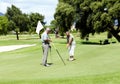 Man with flag, old woman or golfer on golf course for a birdie, putting stroke or exercise in retirement. Senior couple Royalty Free Stock Photo