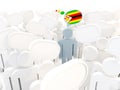 Man with flag of zimbabwe in a crowd Royalty Free Stock Photo