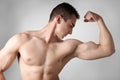 Man flexing biceps muscles Royalty Free Stock Photo