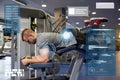 Man flexing leg muscles on gym machine Royalty Free Stock Photo