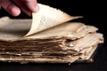 Man flips through an old copy of the Bible Royalty Free Stock Photo