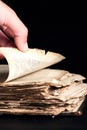 Man flips through an old copy of the Bible Royalty Free Stock Photo