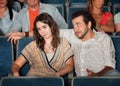 Man Flirting in Theater Royalty Free Stock Photo