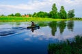 A man is floating on a kayak. Nature.