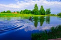 A man is floating on a kayak. Nature.