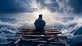 A man floats on a homemade log raft at sea Royalty Free Stock Photo