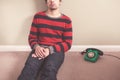 Man on floor with telephone Royalty Free Stock Photo