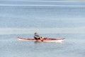 Man floting on the river in his canoe Royalty Free Stock Photo