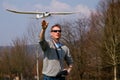 A man flying a model plane