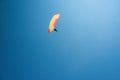 man flying on paraglider blue sky on background Ukraine Crimea