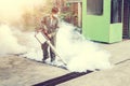 The man fogging to eliminate mosquito for prevent spread dengue fever Royalty Free Stock Photo