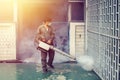 The man fogging to eliminate mosquito for prevent spread dengue fever Royalty Free Stock Photo