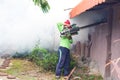 Man Fogging to prevent spread of dengue fever in thailand