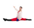 Man in folk ukrainian costume makes splits Royalty Free Stock Photo