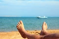 Man foots on beach Royalty Free Stock Photo