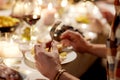 Man with fork eating at christmas dinner at home Royalty Free Stock Photo