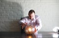 A man with a fortune teller ball Royalty Free Stock Photo