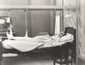 Man with fractured leg sleeping on hospital bed Royalty Free Stock Photo