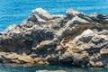 Man Free Climbing on the Cliff of Liguria - La Spezia Italy Royalty Free Stock Photo