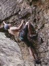 Man free climbing on rock outdoor. Royalty Free Stock Photo