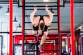 Man at freestyle Calisthenics training in gym Royalty Free Stock Photo