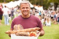 Man With Fresh Bread Bought At Outdoor Farmers Market Royalty Free Stock Photo