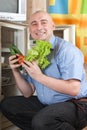 Man with fresh vegetables Royalty Free Stock Photo