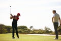 Man, friends and swing with club on golf course for stroke, point or strike on grass field in nature. Male person Royalty Free Stock Photo