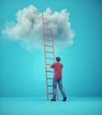 Man in front of a ladder to heaven. The concept of success