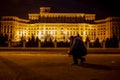 Man in front of Palace of Parliament, Bucharest, Romania Royalty Free Stock Photo