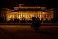 Man in front of Palace of Parliament, Bucharest, Romania