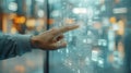 A man in front of a transparent touch screen with icons presses buttons. Internet of Things, information technology