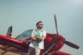 Man in front of vintage plane Royalty Free Stock Photo