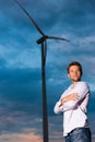 Man in front of windmill and sky Royalty Free Stock Photo