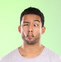 Man, funny and comic face in studio with silly, goofy and emoji mouth with fun attitude for humor. Model, person and