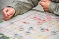 Man gambling at chinese chess Royalty Free Stock Photo