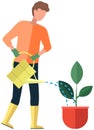 Man gardener waters flower in pot from watering can. Guy takes care of green plant with big leaves