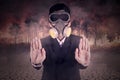 Man with gas mask stops the fire forest Royalty Free Stock Photo