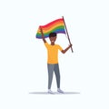 Man gay holding lgbt rainbow flag love parade pride festival concept smiling african american male cartoon character