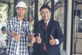 Man Gesture sign Thumbs up in office success executive. Close up businessman hands Positive idea good business man happy person.