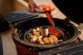 Man get out of the grill prepared vegetables Royalty Free Stock Photo