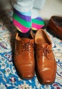 Man getting ready, shoes and socks in home, putting on business fashion on foot and start to day. Businessman dressing