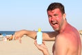 Man getting sunburned at the beach Royalty Free Stock Photo