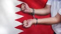 A man getting under arrest in Bahrain. Concept of being handcuffed, detained, incarcerated and jailed in said country. National