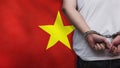 A man getting under arrest in Vietnam. Concept of being handcuffed, detained, incarcerated and jailed in said country. National Royalty Free Stock Photo