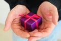 Man gifting small present Royalty Free Stock Photo