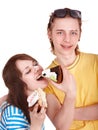 Man and girl eating cake. Royalty Free Stock Photo